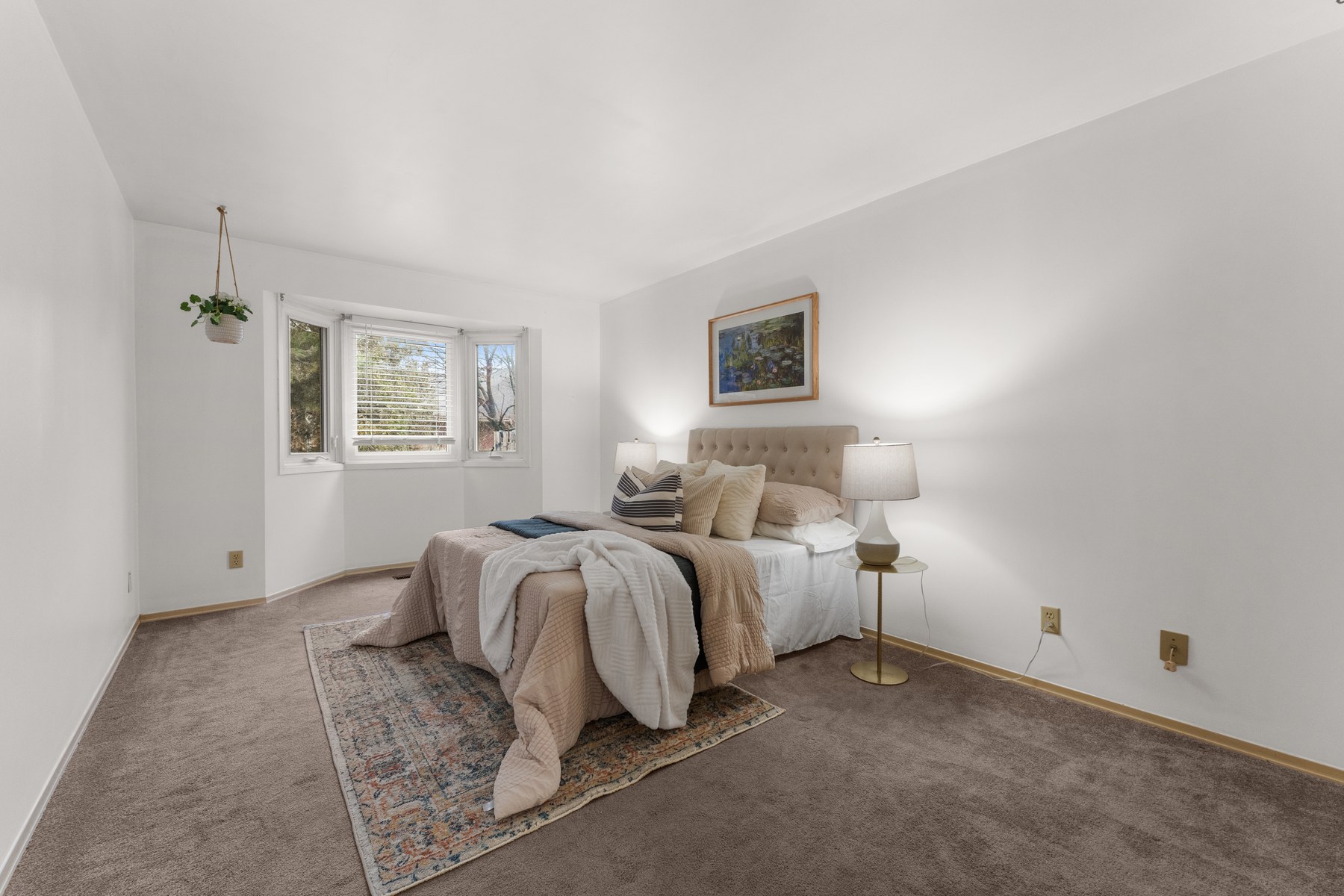 After staging: the same bedroom fully staged